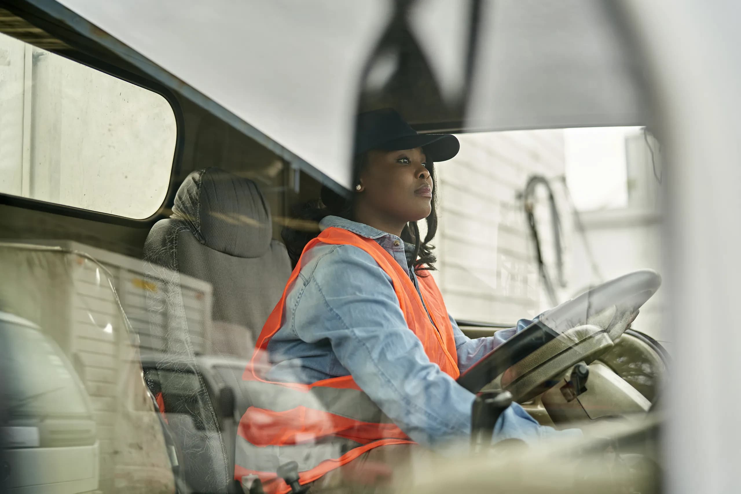 Driver sitting in commercial vehicle.